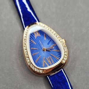 Elegant Blue and Gold Watch with Crystal Accents